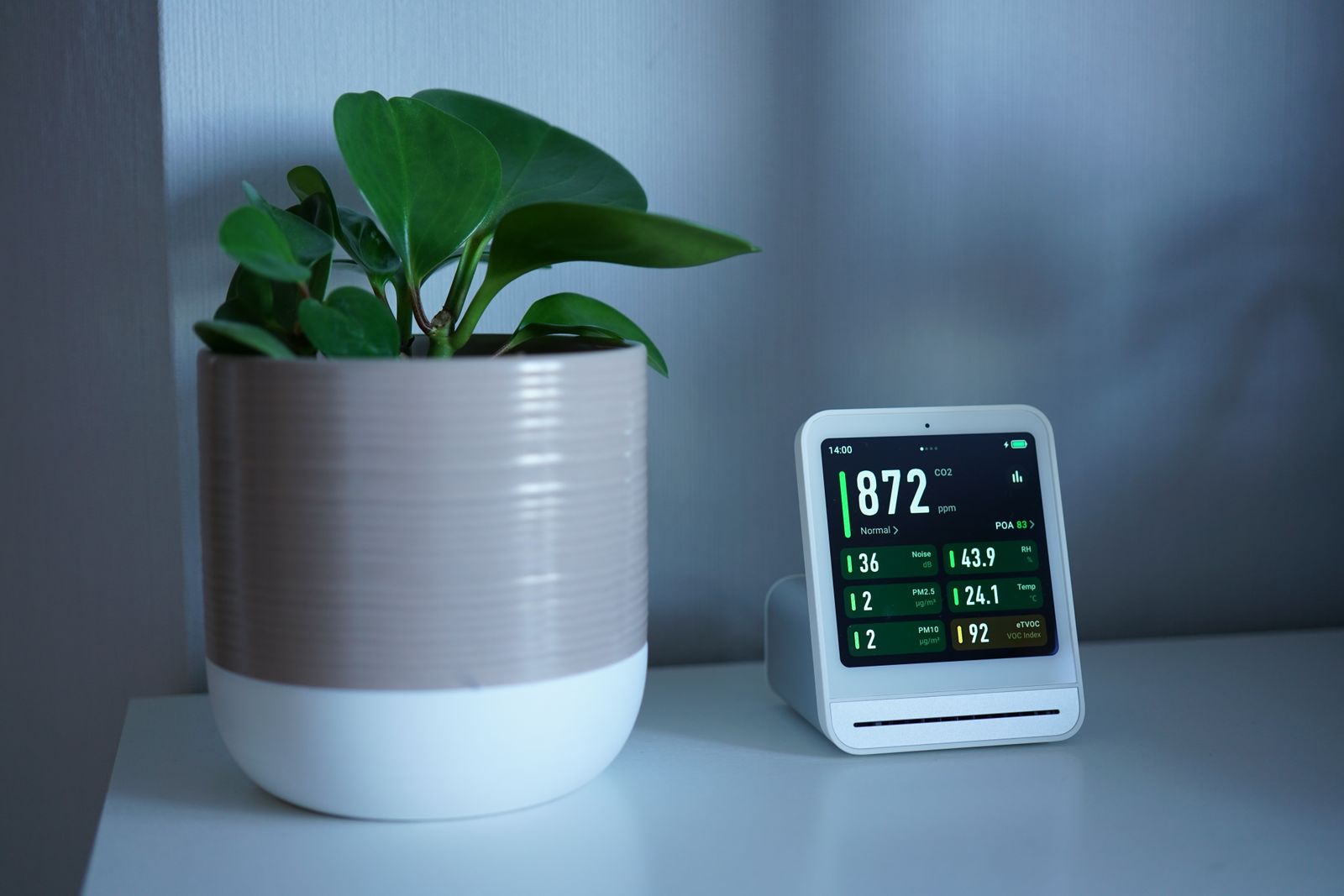 Air quality monitoring device representing post-mitigation verification